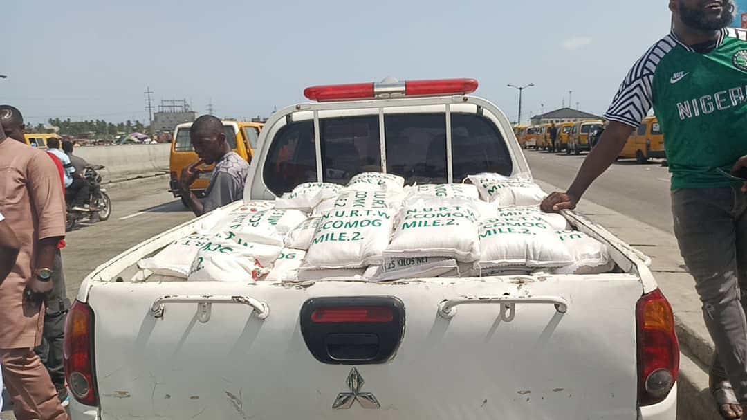 NURTW boss distributes food palliatives to truck drivers in Lagos